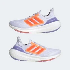 ADIDAS Women's Ultraboost Light Running Shoe - Ftwr White/Solar Red/Beam Pink - Regular (B) -Optimal Sportswear Store 01bf57a00c1544999684af9c01358231 9366