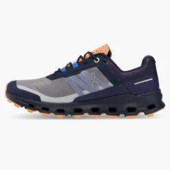 On Running Women's Cloudvista Trail Shoe - Midnight/Copper- Regular (B) -Optimal Sportswear Store 64.98592 cloudvista fw22 midnight copper w g4