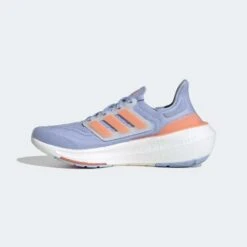 ADIDAS Women's Ultraboost Light Running Shoe - Blue Dawn/Coral Fusion/Blue Fusion - Regular (B) -Optimal Sportswear Store 8461b9df8b234367ad5faf89013681a7 9366